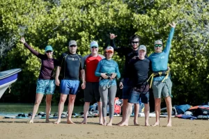 Group of kitesurfers riding together in La Guajira