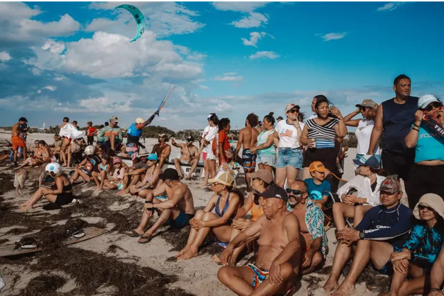 Crowd enjoying the beach and watching kitesurfers during Kite Fest Guajira in La Guajira.