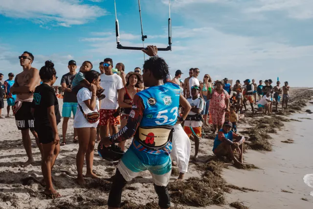 Crowd enjoying the beach and watching kitesurfers during Kite Fest Guajira in La Guajira.