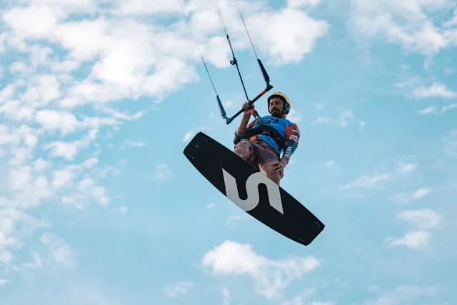 Kitesurfer riding on the water during a competition at Kite Fest Guajira in Mayapo.